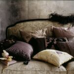 sofa-filled-with-chocolate-coloured-cushions-
