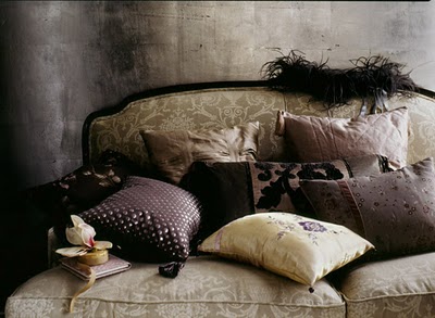 sofa-filled-with-chocolate-coloured-cushions-